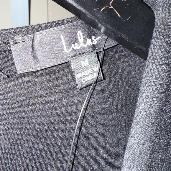 Cocktail hour black sleeveless tulip mini dress - Picture 5 of 7